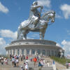 Silver Chinggis Khaan statue above its round base, Mongolia.